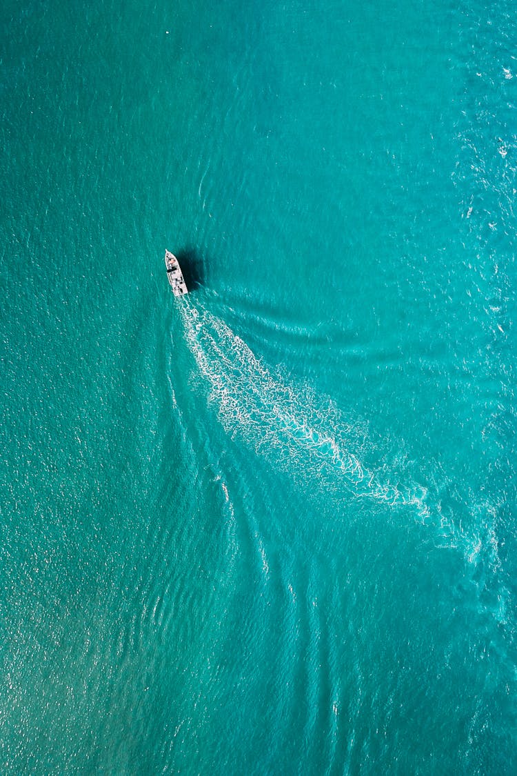 Drone View Of Yacht Sailing In Sea Water