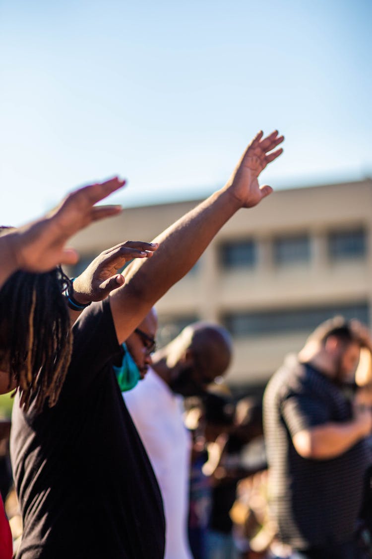 Group Of People Dancing On Street