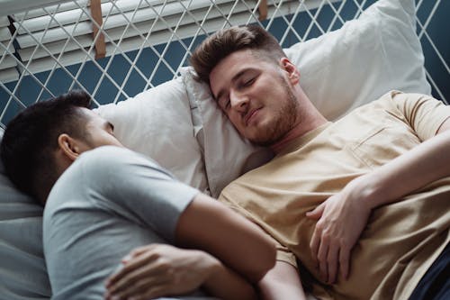 Free Two Men Sleeping Together Stock Photo
