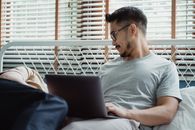 Man in Gray Crew Neck T Shirt Looking at Person Beside Him