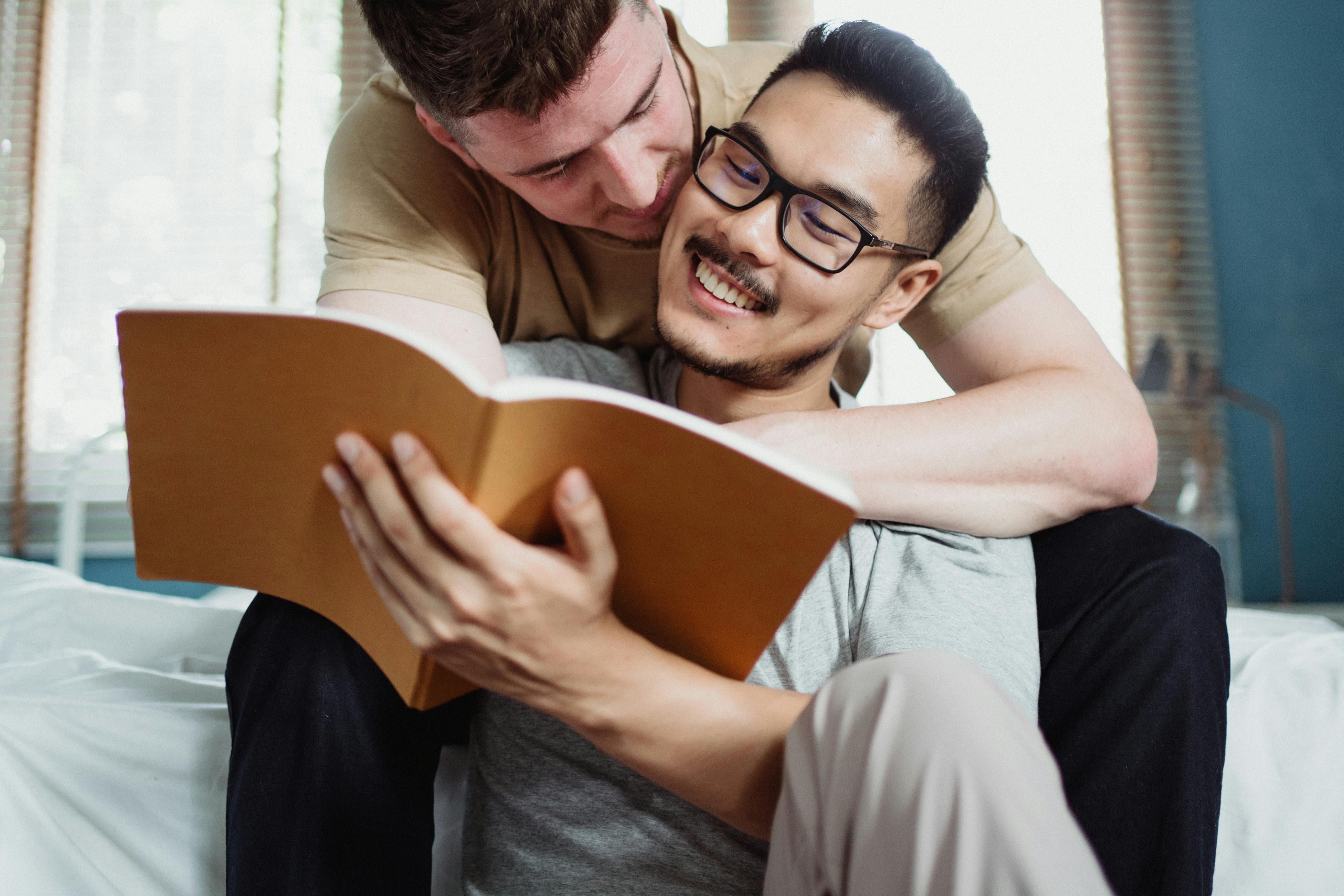 Man Being Embraced by Another Man · Free Stock Photo