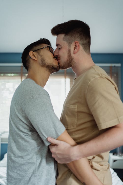 Free Two Men Kissing Stock Photo