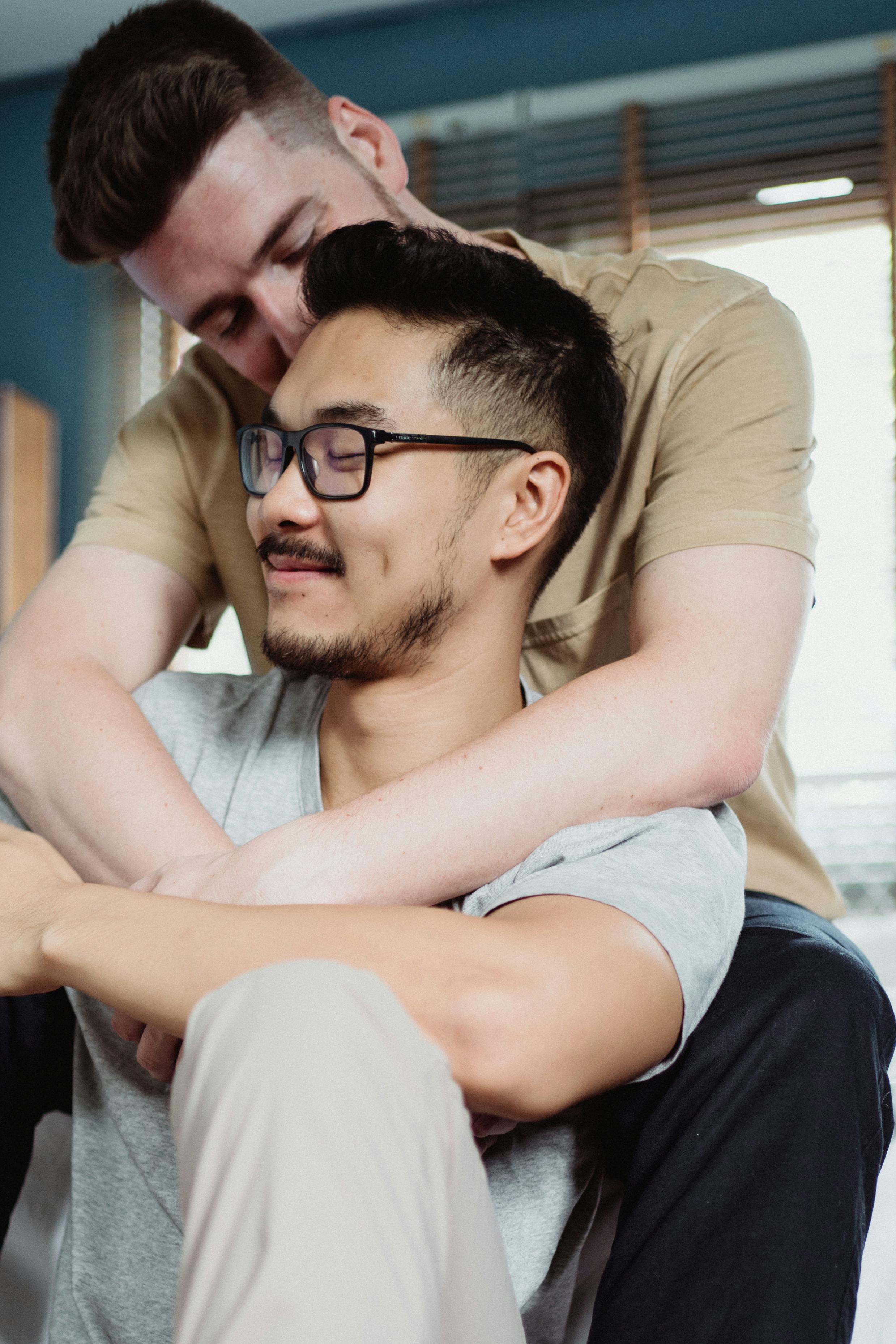 two men being affectionate