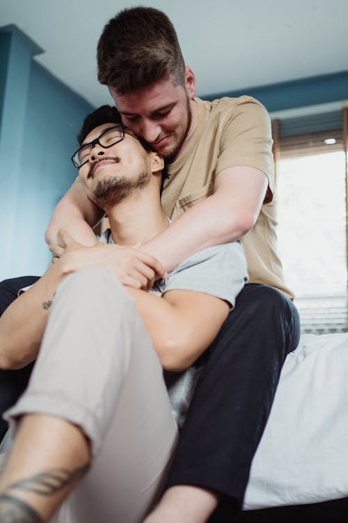 Free Two Men Being Affectionate Stock Photo