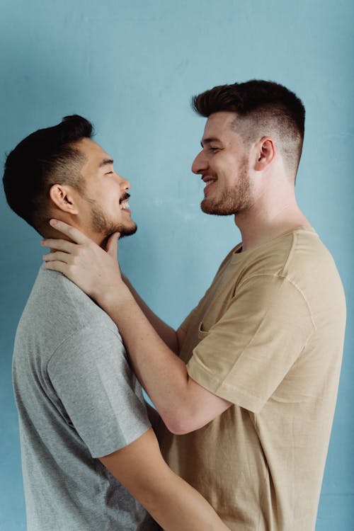 Free Two Men Being Affectionate Stock Photo