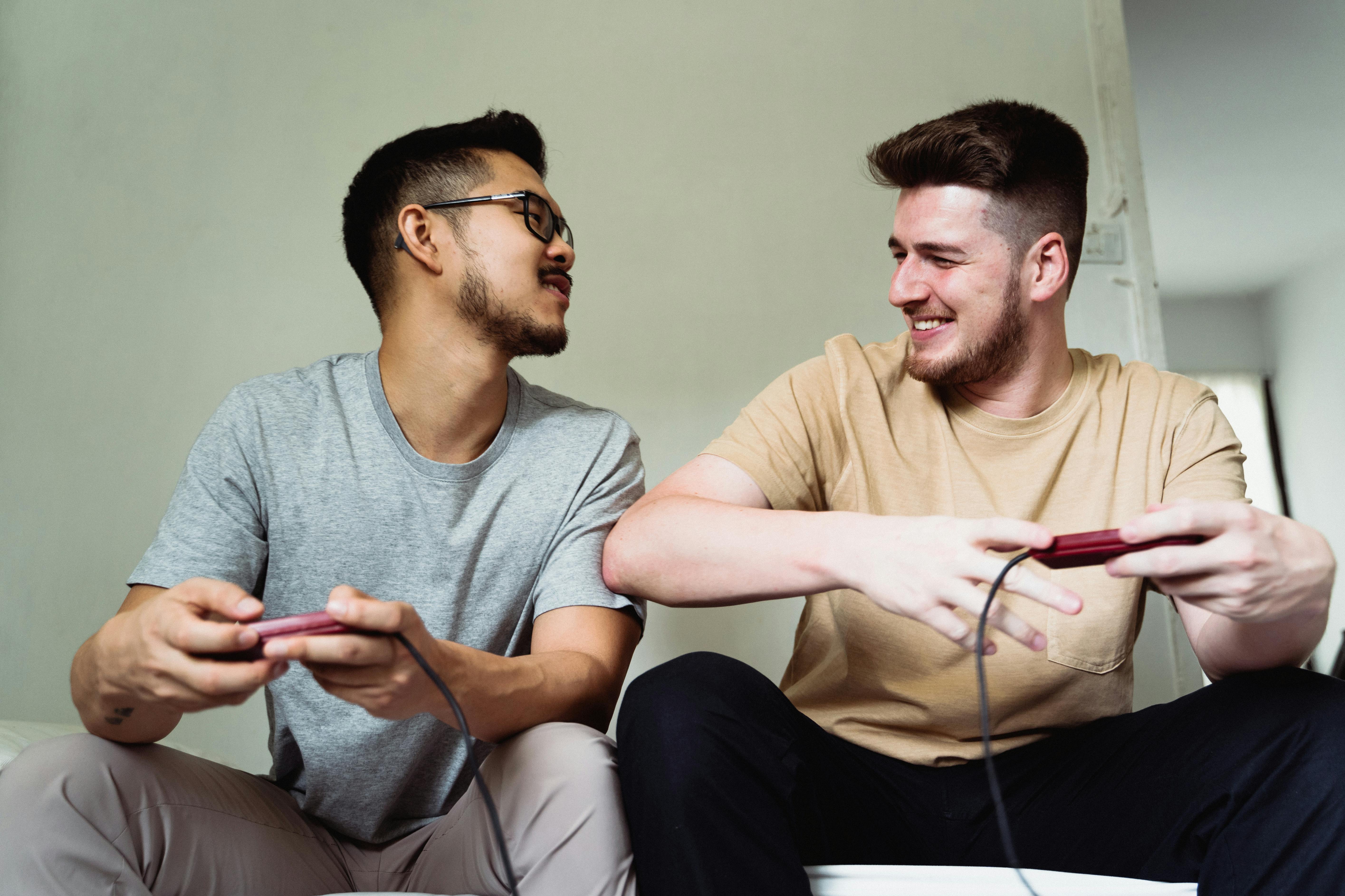 Men Playing Video Game Together · Free Stock Photo