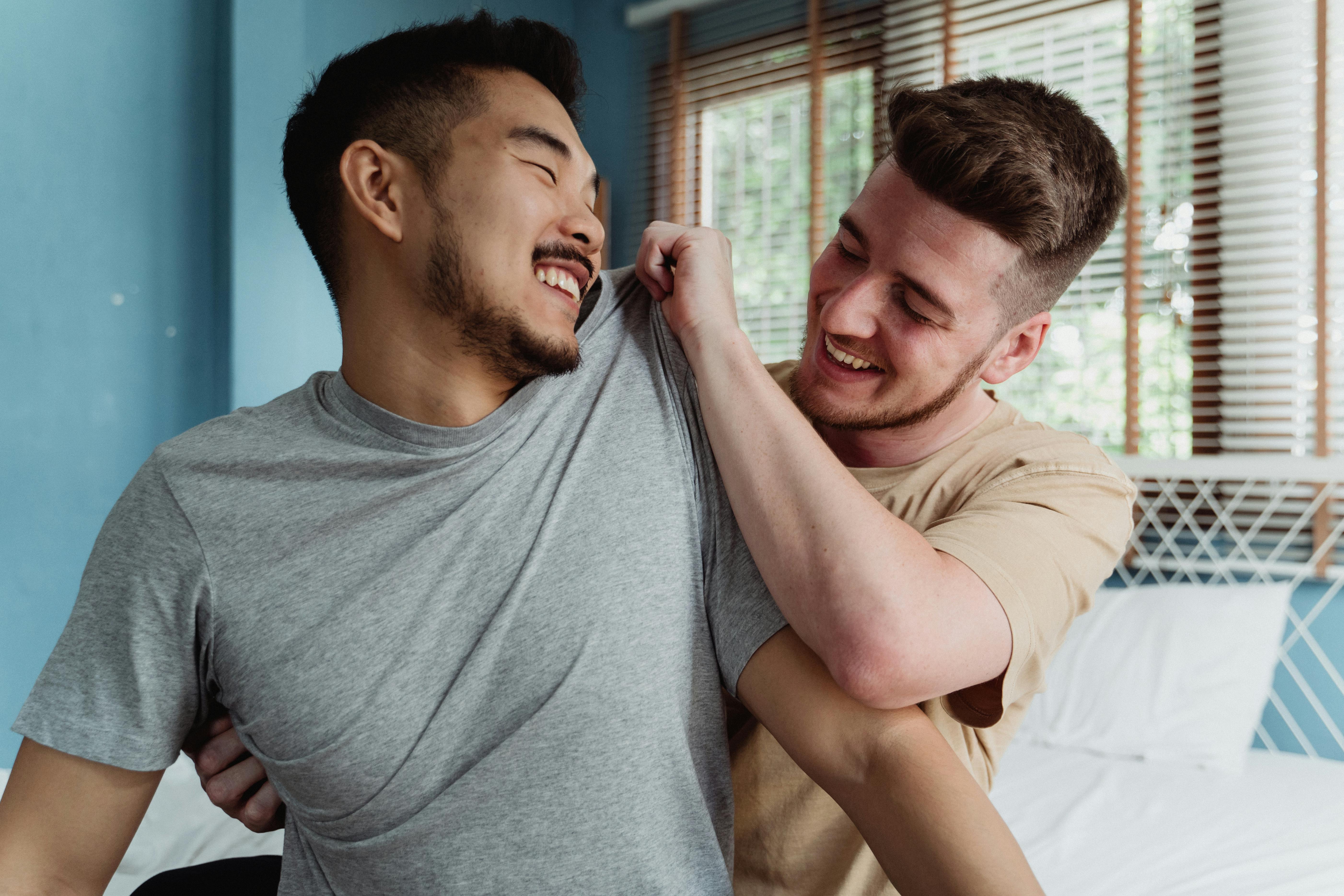 two men being affectionate