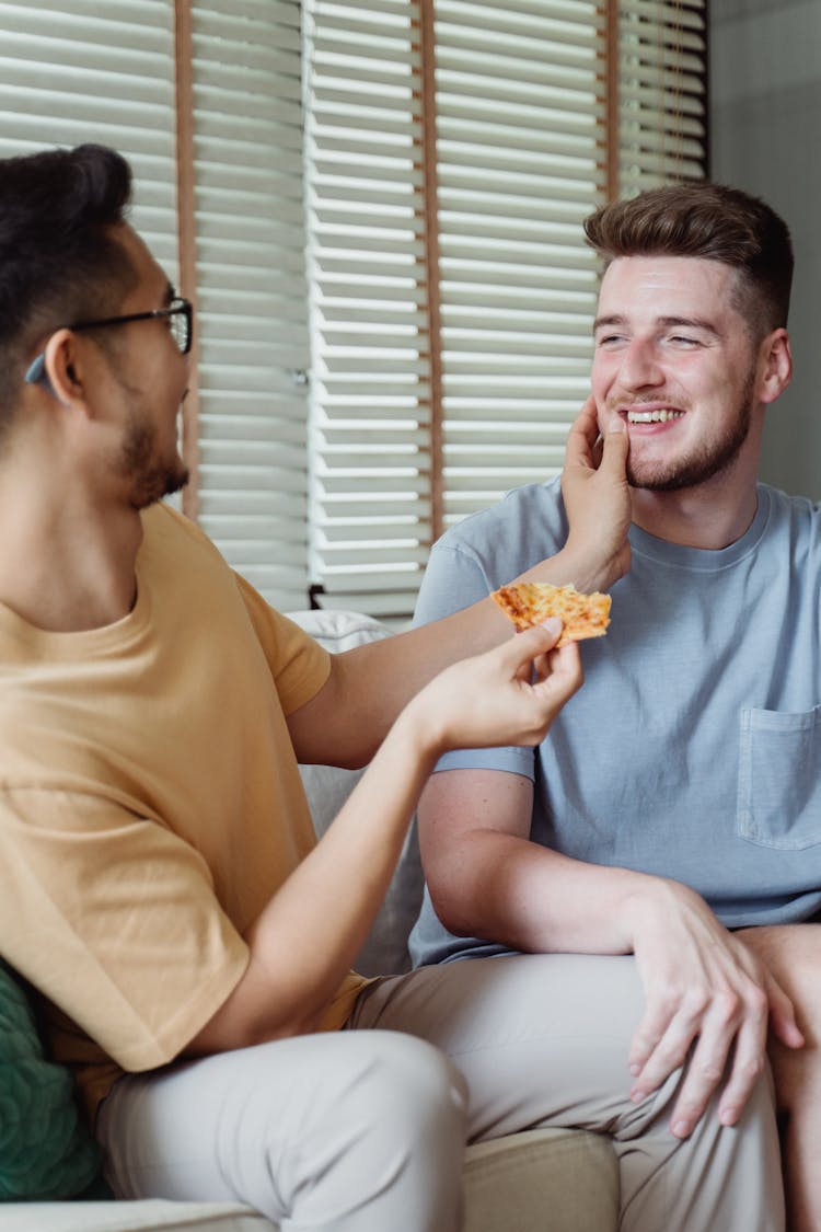 Man Touching Partner Face With Affection