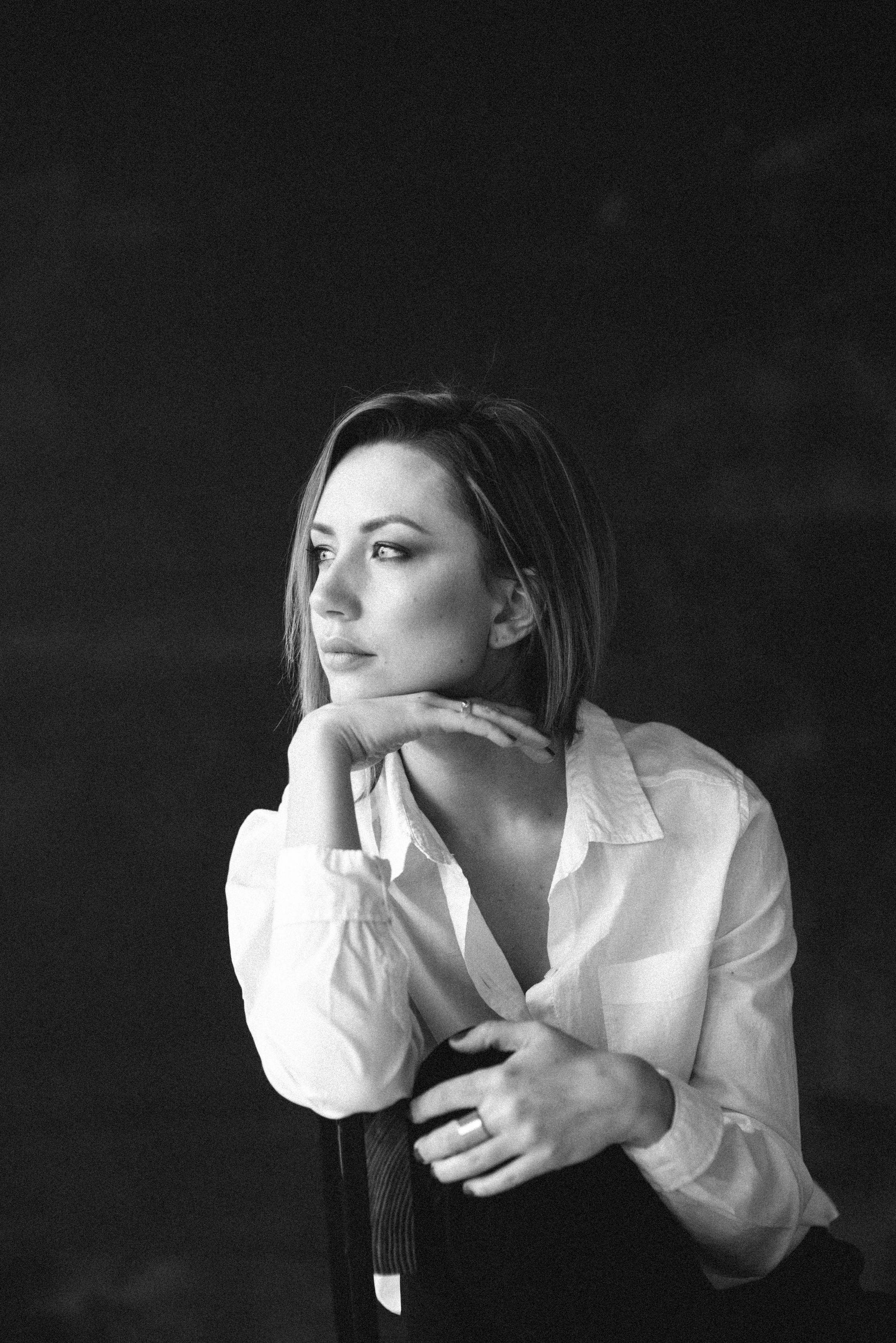 Grayscale Photo of Woman in White Blazer