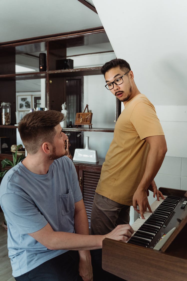 Man Playing Piano Without Looking