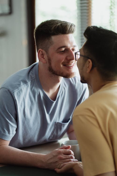 Free Two Men Holding Hands Stock Photo