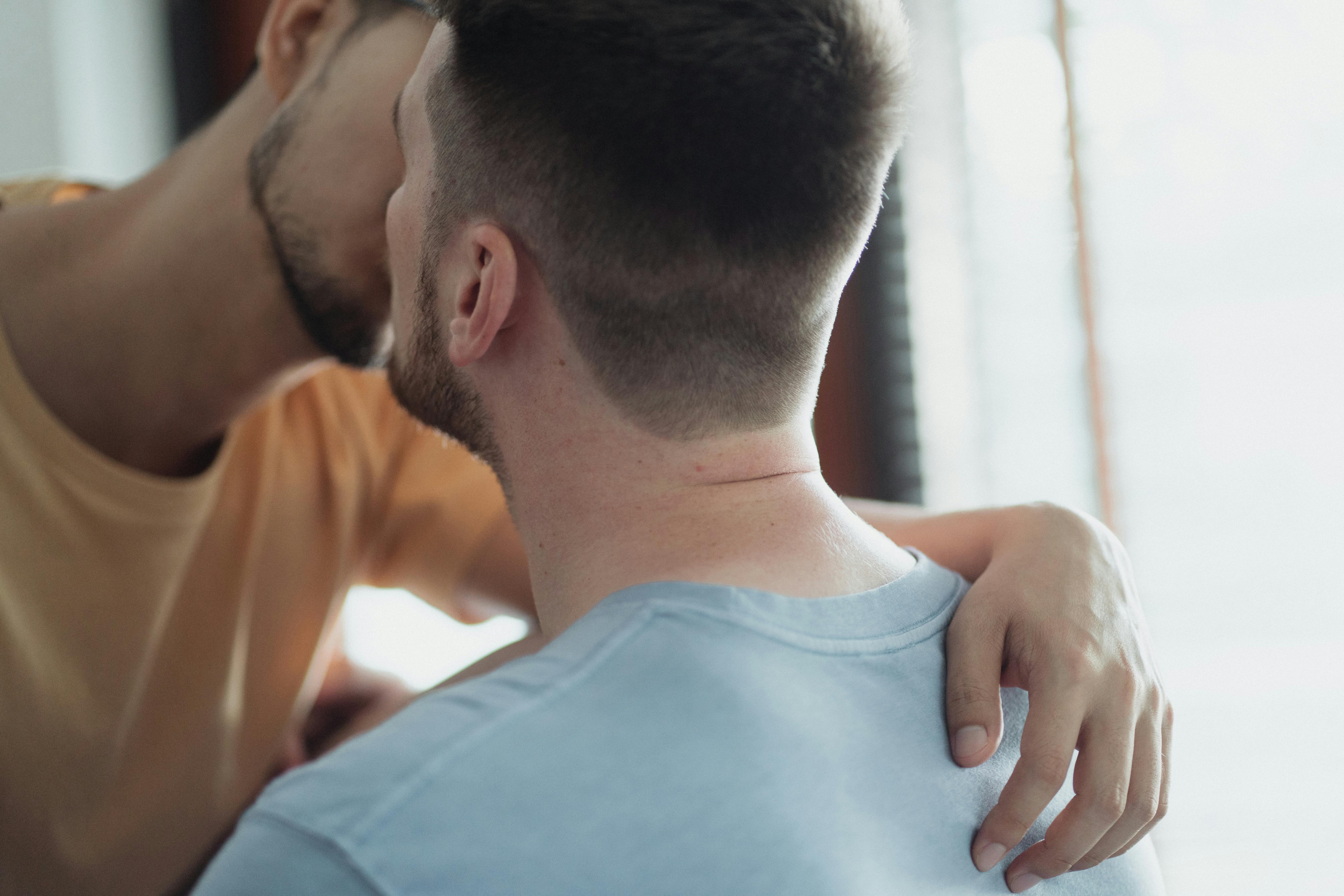 two men kissing