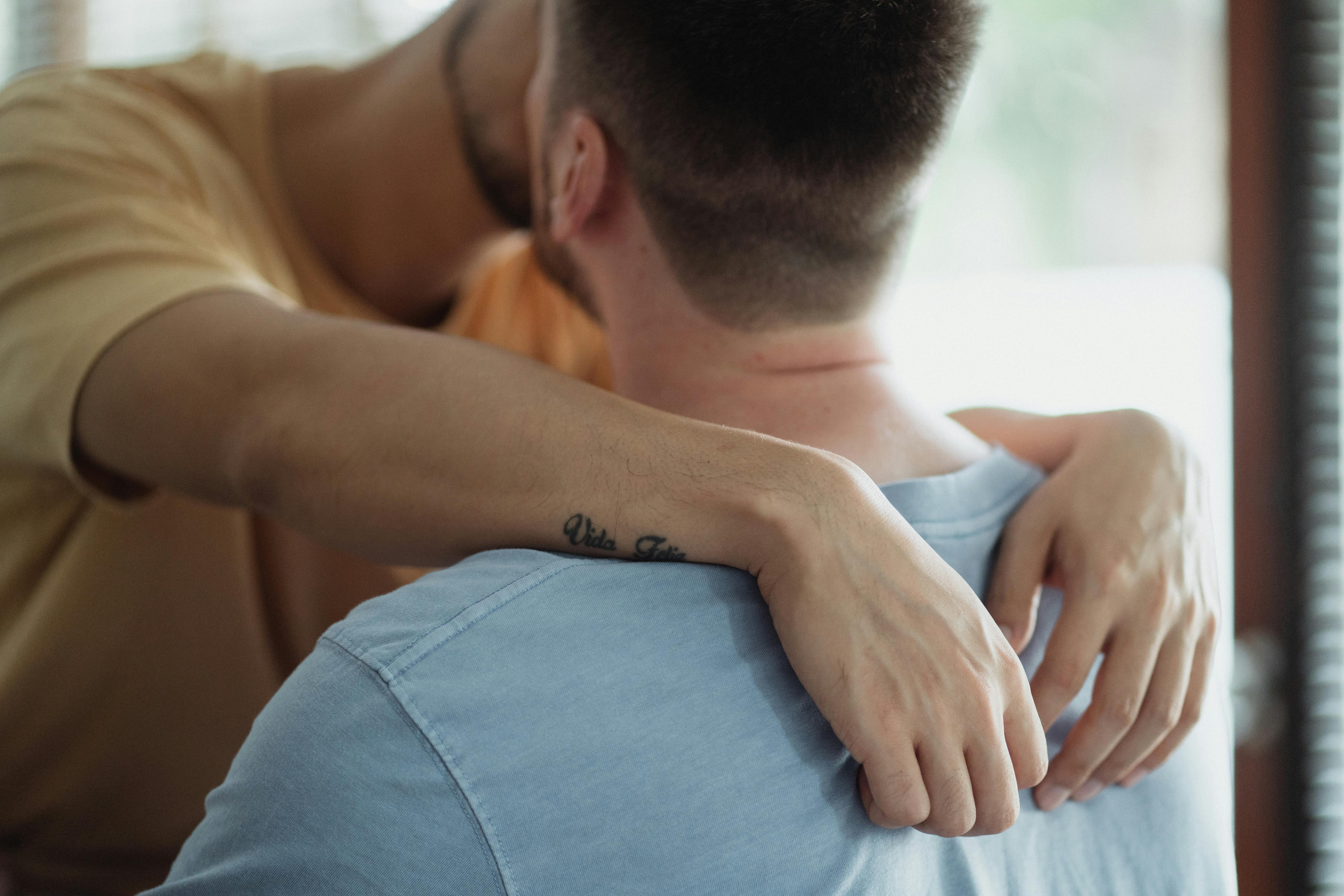 two men kissing