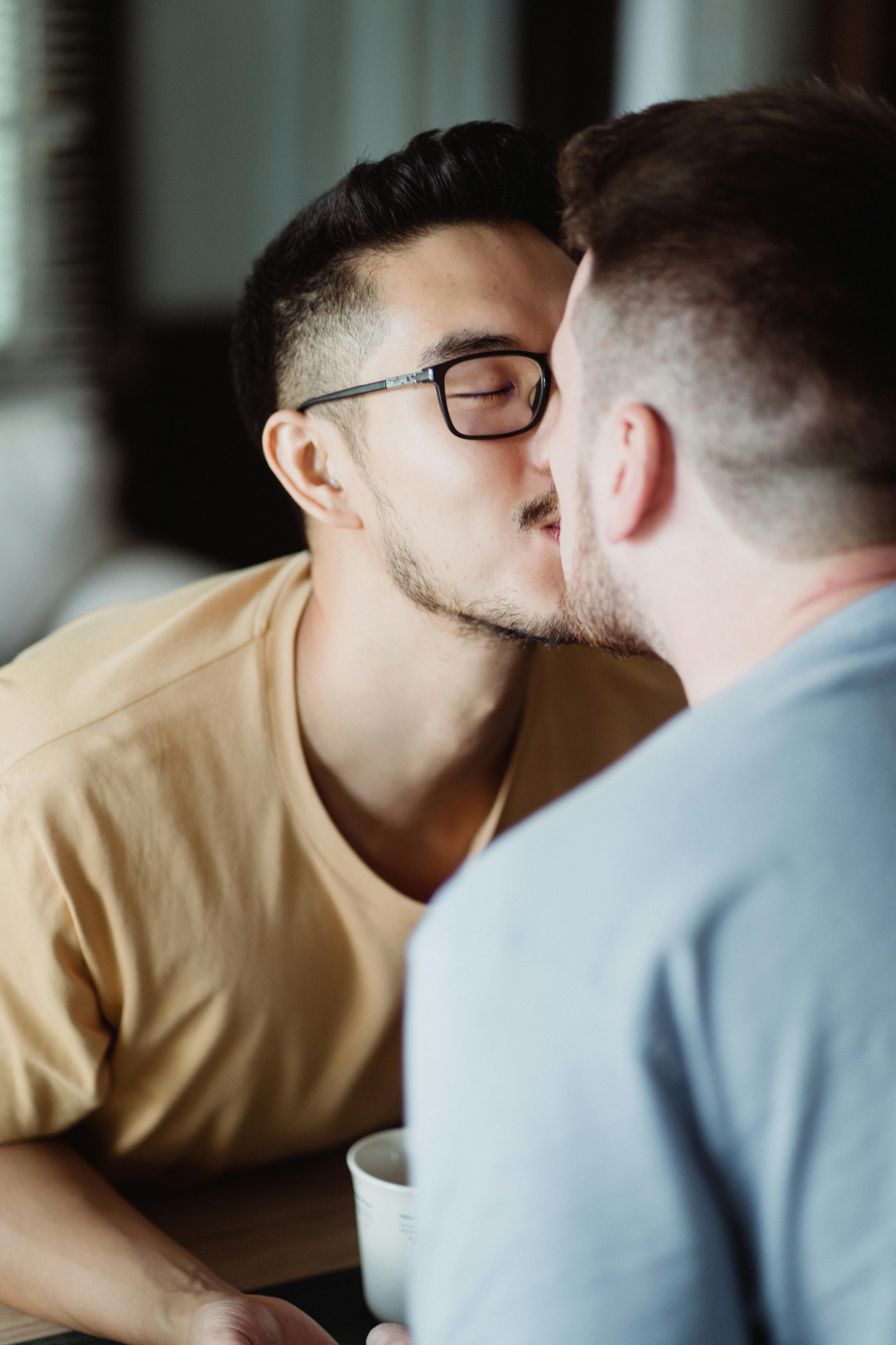 two men kissing