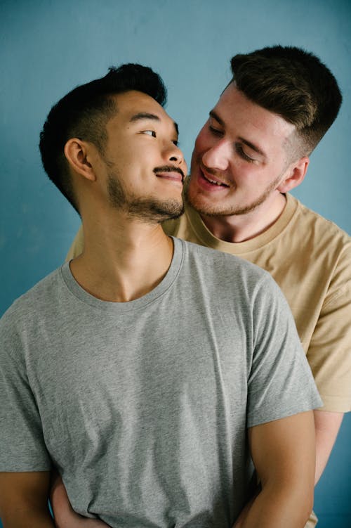 Free Two Men Being Affectionate Stock Photo