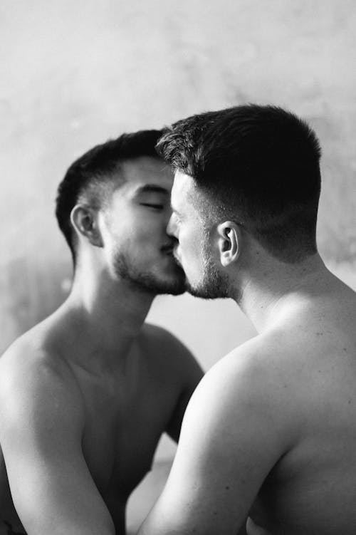 Black and White Picture of Men Kissing