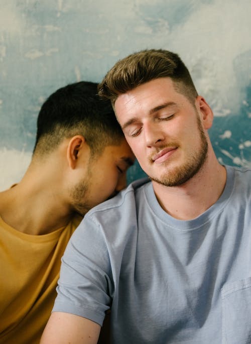 Free Two Men Being Affectionate Stock Photo