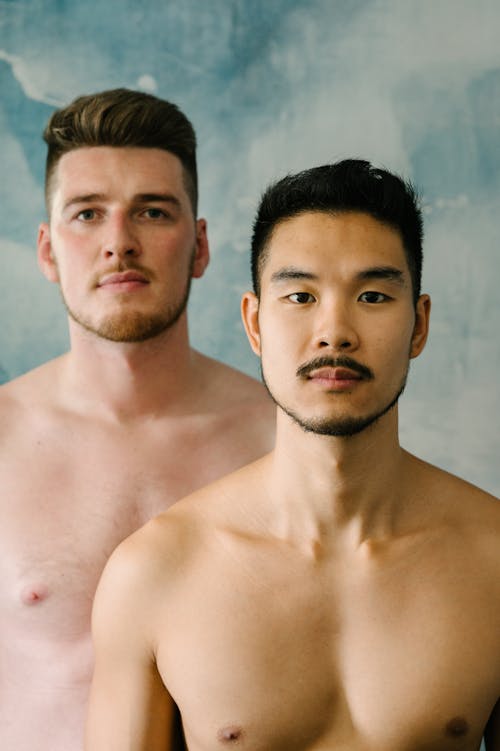 Two Shirtless Men