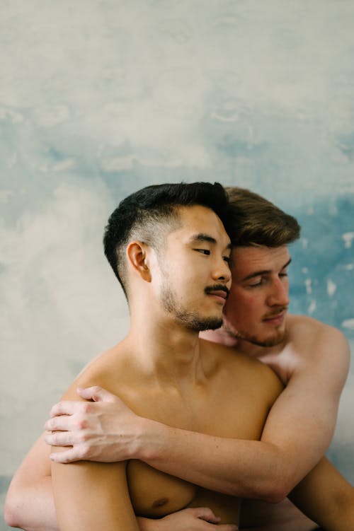 Free Two Shirtless Men Hugging Stock Photo