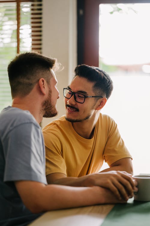 Free Two Men Holding Hands Stock Photo