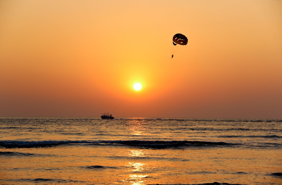 Long-angle Silhouette Photography of Paraglider