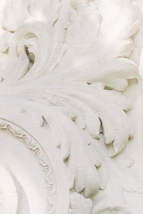Free Detailed Leaves Made of White Concrete Plaster Stock Photo