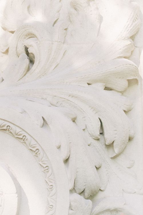 Free Detailed ornamental bas relief capturing Spanish architectural style. Stock Photo