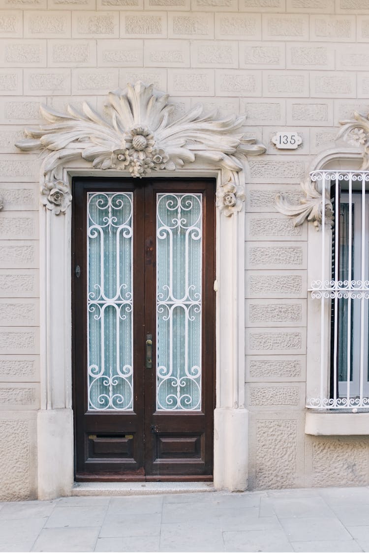 Bas Relief Above Closed Glass And Wooden Doors 