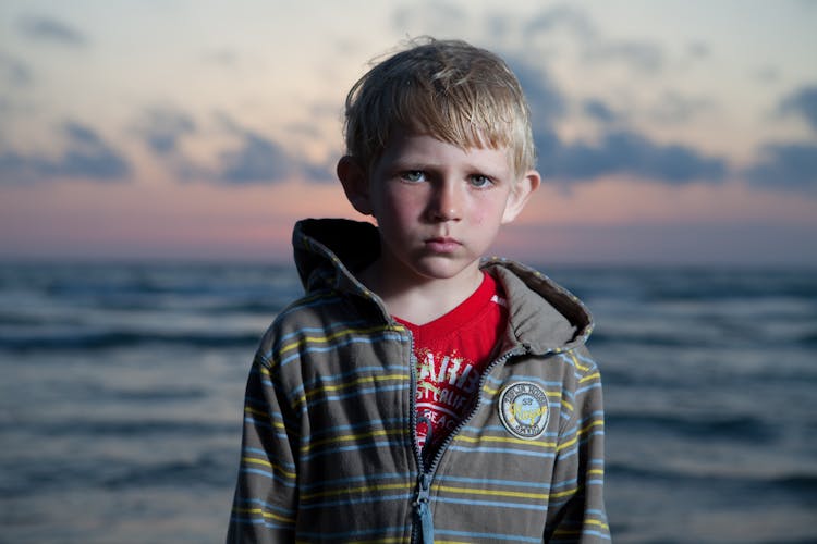 Gray Eyed Boy Wearing Hoodie Jacket