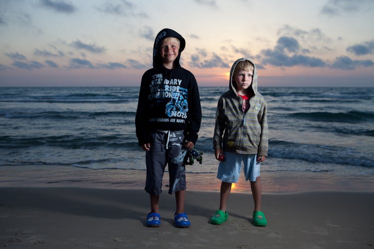 Blond Kids Wearing Matching Foam Clog Shoes