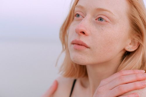 Free Close-up portrait celebrating natural beauty and skin positivity. Stock Photo