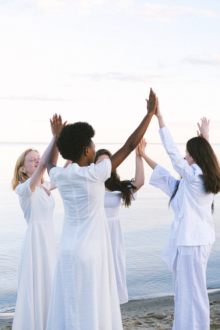 Women In White Dress Dancing On Beach