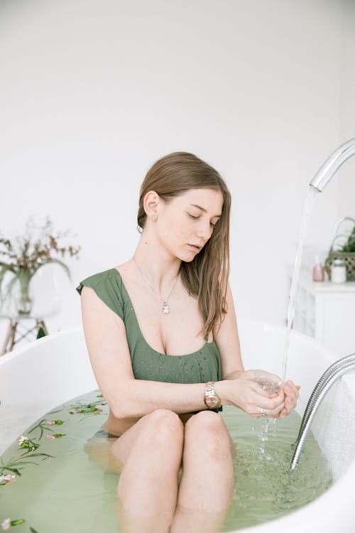 Photo Of Woman On Bathtub