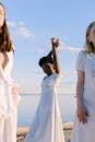 Photo Of Women Standing Beside Each Other