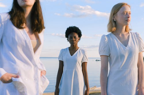 Photo Of Woman Standing Near Each Other