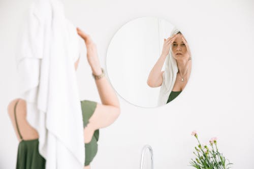 Photo Of Woman In Front Of Mirror