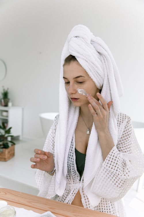 Photo Of Woman Wearing Bathrobe