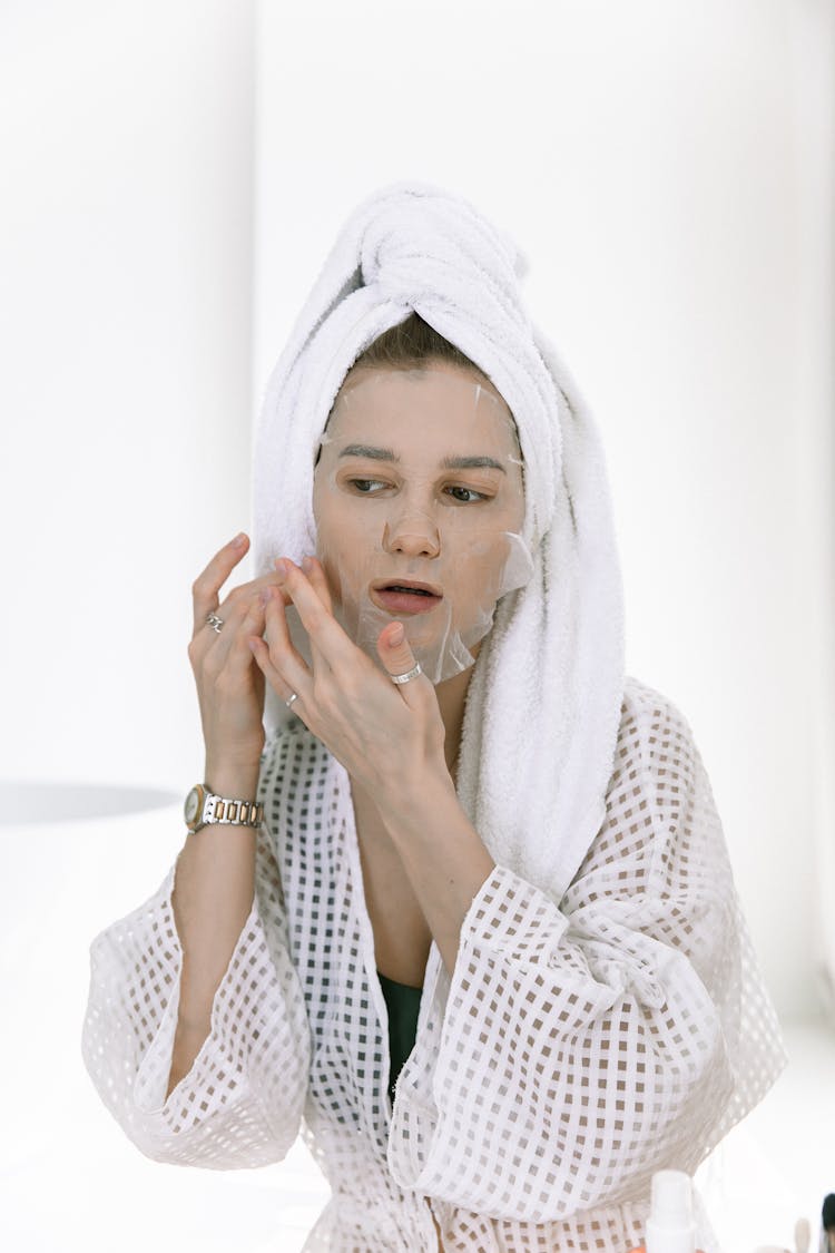 Photo Of Woman Touching Her Face