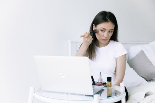 Photo Of Woman Looking On Laptop