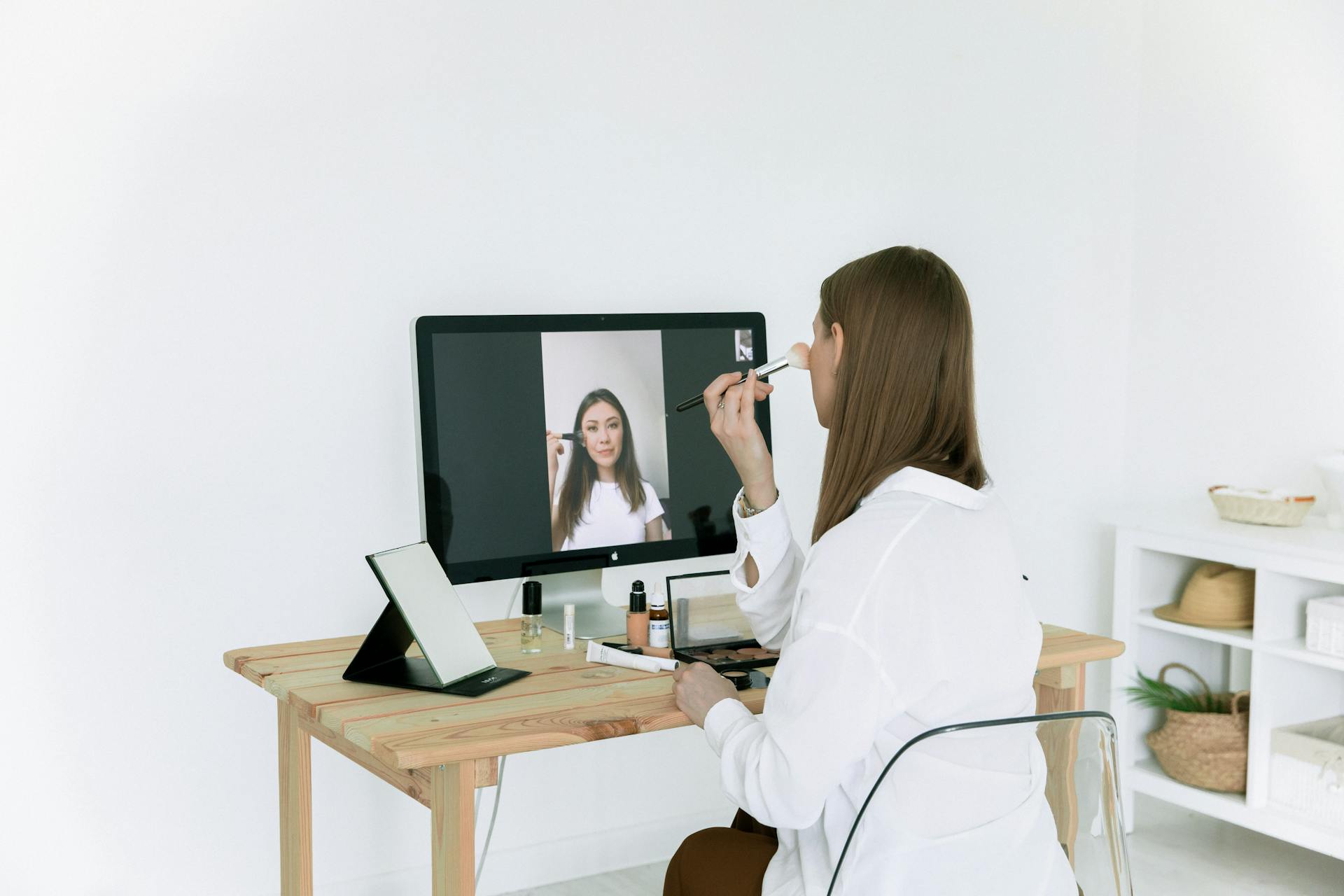 Photo Of Woman Looking On Desktop