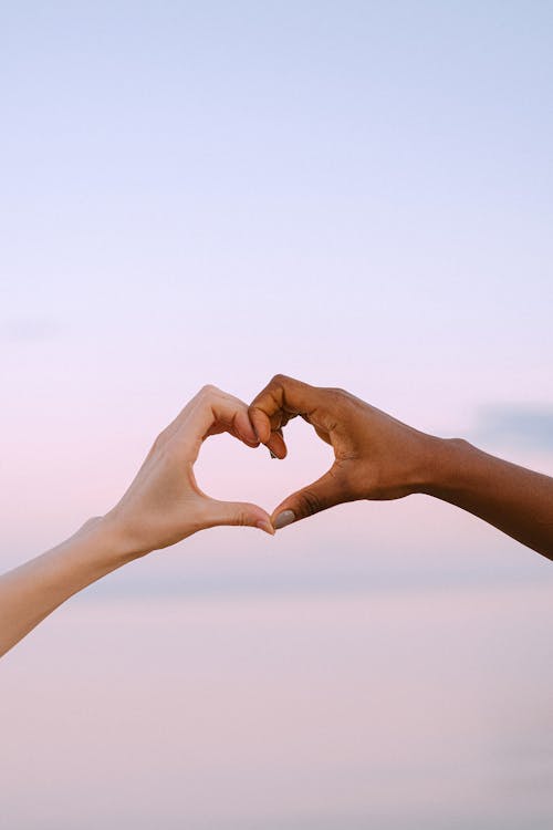 Free Hands Forming a Heart Shape Stock Photo