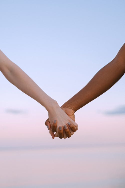 2 Person Holding Hands · Free Stock Photo