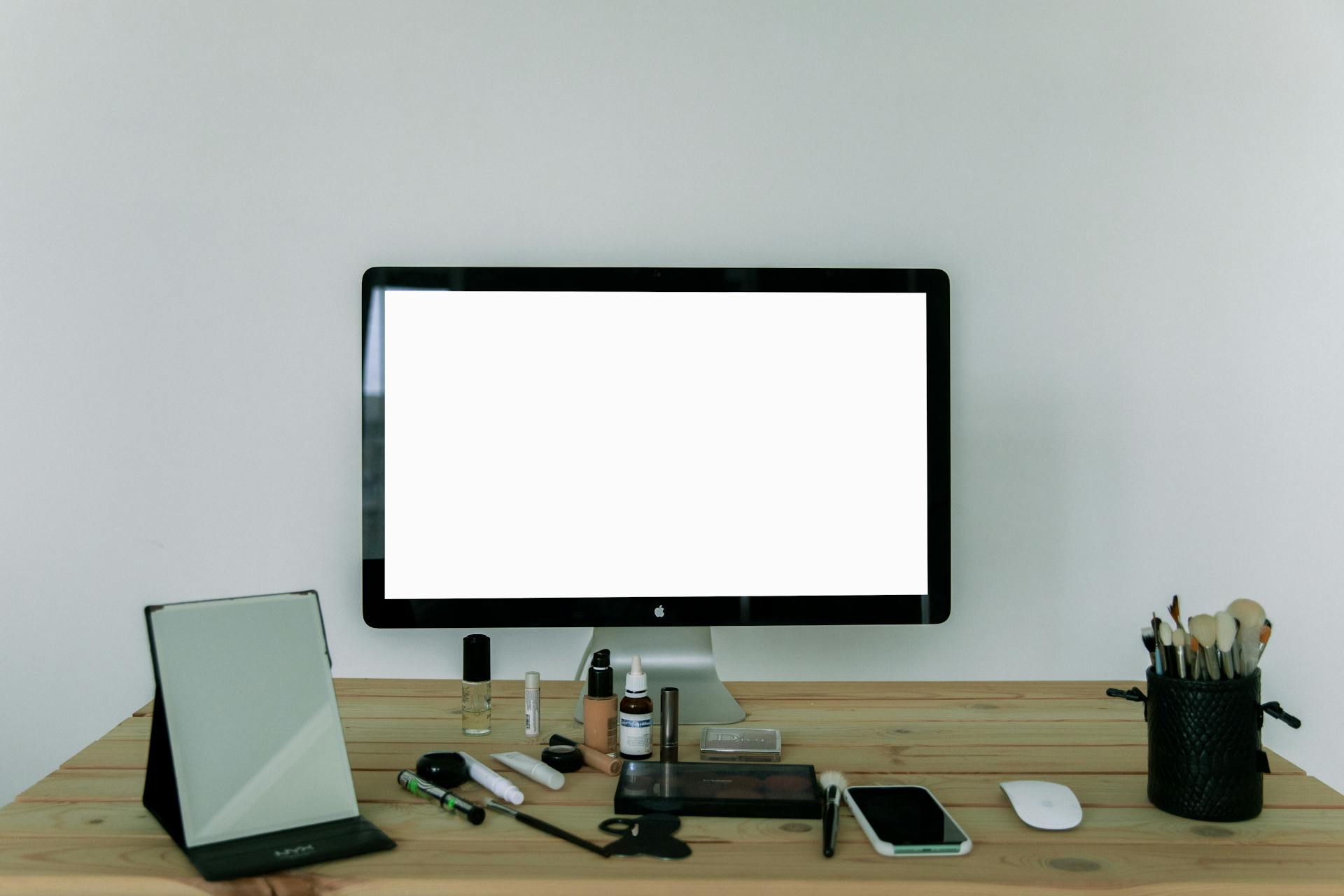 Photo Of Computer On Wooden Table 