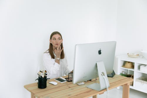 Photo Of Woman Touching Her Lips