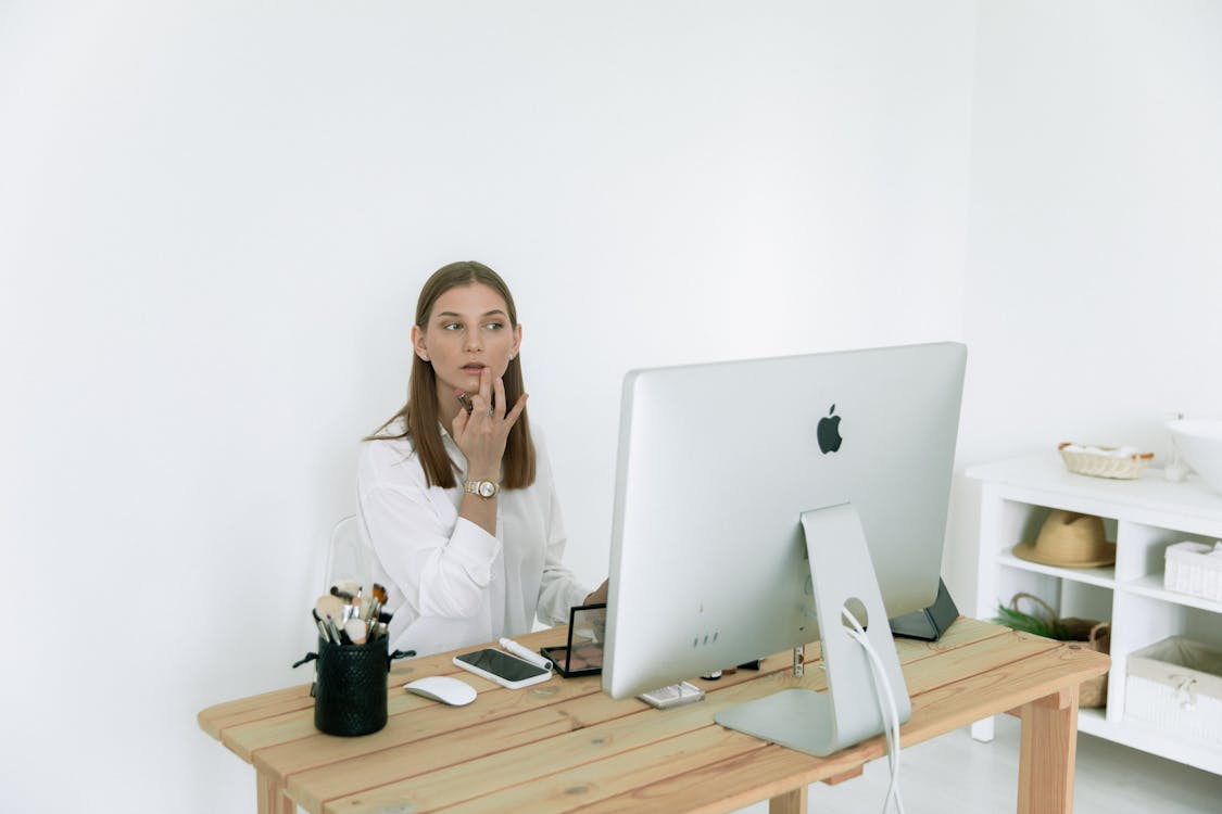 Photo Of Woman Touching Her Lips