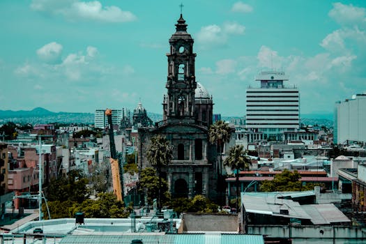 A vibrant view of historic architecture amidst the urban landscape of Guadalajara, Mexico.