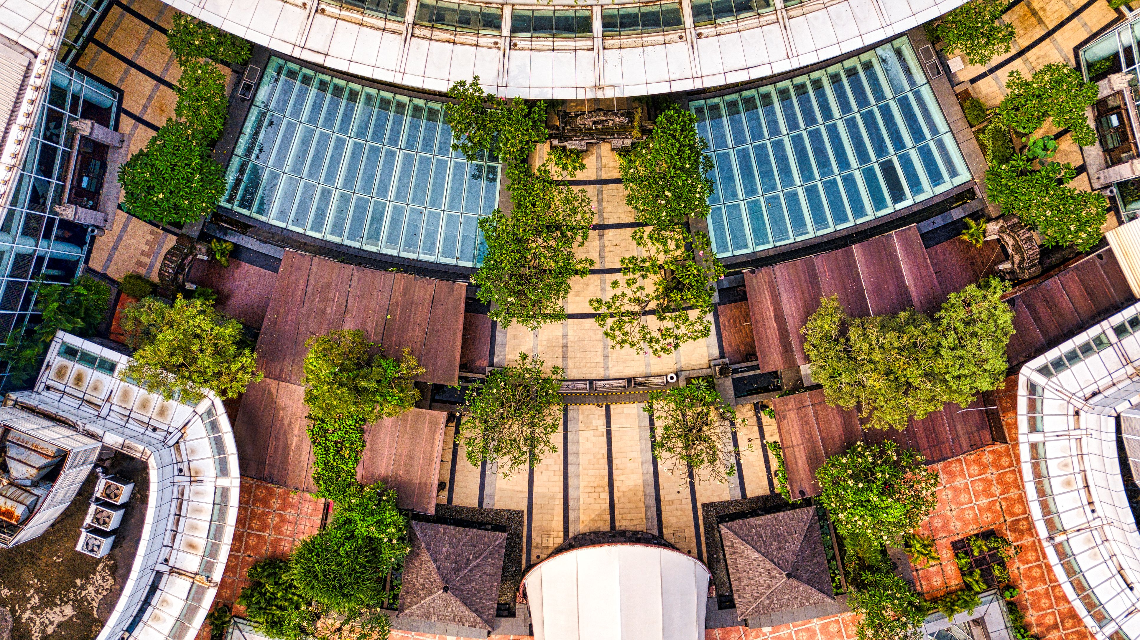 Aerial view of a modern building surrounded by greenery in Banten, Indonesia.