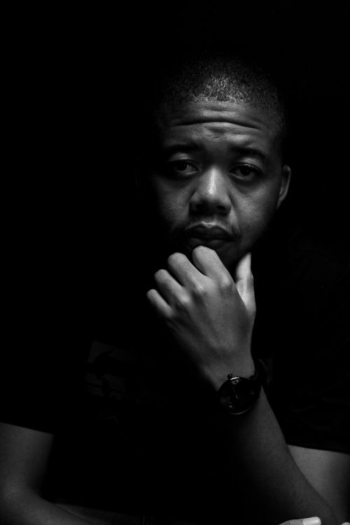 Free Thoughtful black and white portrait capturing a man's contemplative stare. Stock Photo
