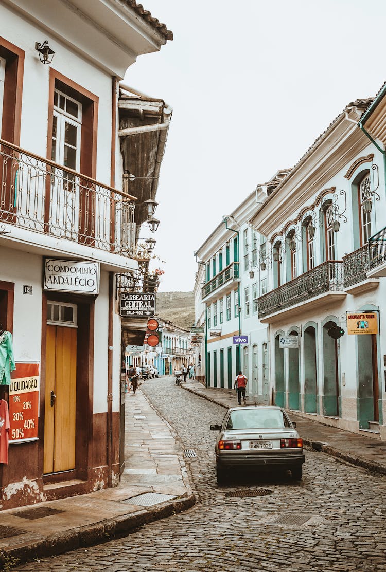 Car Passing On A Narrow Street