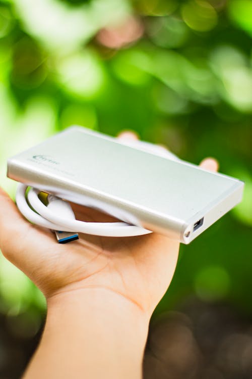 Photo Of Person Holding Power Bank